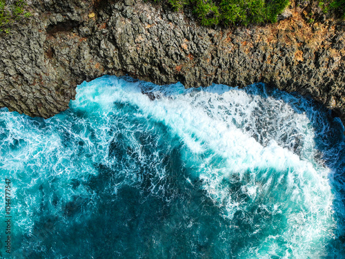 defaultA beautiful ocean with a rocky shoreline photo