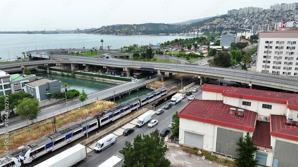 4k Train in the city - aerial tracking and high quality image of the train in Izmir with drone 