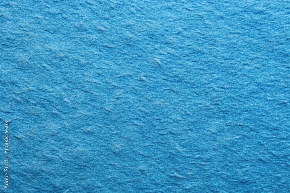 Obraz premium Silhouette texture of blue handmade paper in macro