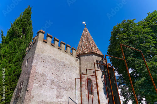 Scenic view of medieval Principescco Castle with clay tiles at Italian City of Meran on a sunny summer day. Photo taken July 18th 2024, Merano Meran, Italy. photo