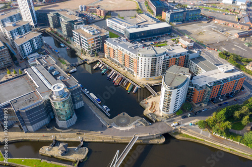 Obraz na płótnie Aerial drone photo of the Leeds city centre showing the main city centre from above on a bright sunny summers day in the West Yorkshire city w salonie
