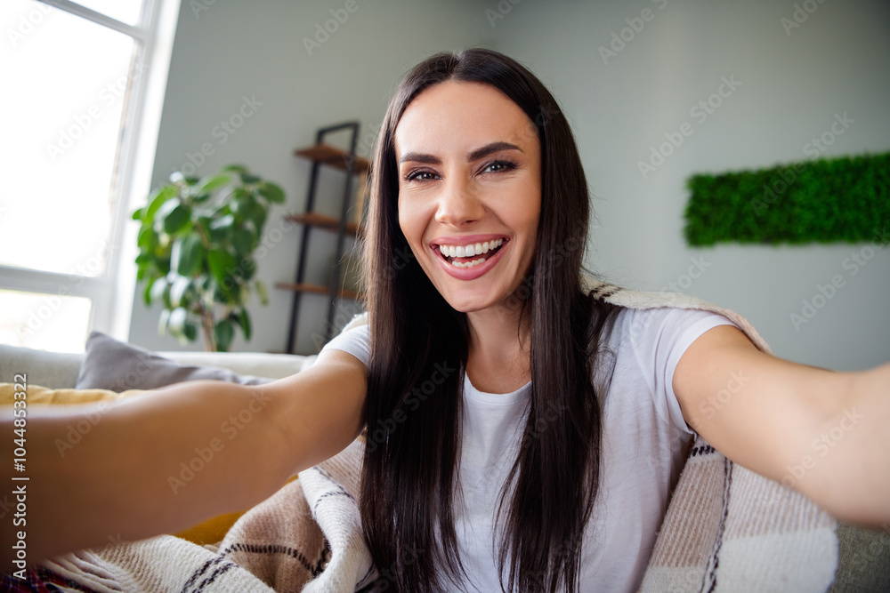 Photo of pretty young lady take selfie laugh wear pajama weekend modern interior apartment indoors Photo of pretty young lady take selfie laugh wear pajama weekend modern interior apartment indoors
