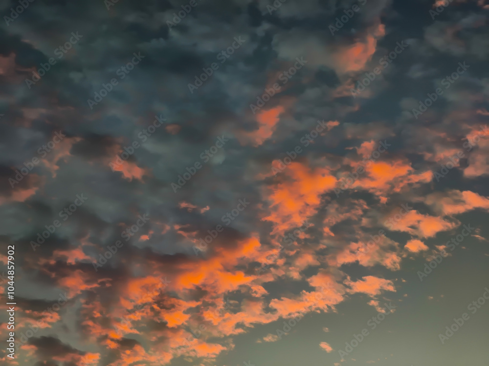 Fototapeta premium Beautiful sunset with clouds in the sky. Nature background and texture.