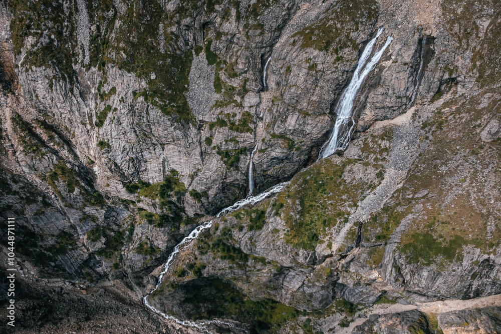 Aerial view of beautiful high altitude mountain waterfall landscape Aerial view of beautiful high altitude mountain waterfall landscape