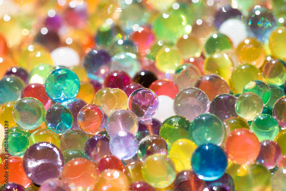different color balls, Water beads close-up, Texture of Hydrogel balls or many colorful orbeez background. different color balls, Water beads close-up, Texture of Hydrogel balls or many colorful orbeez background.