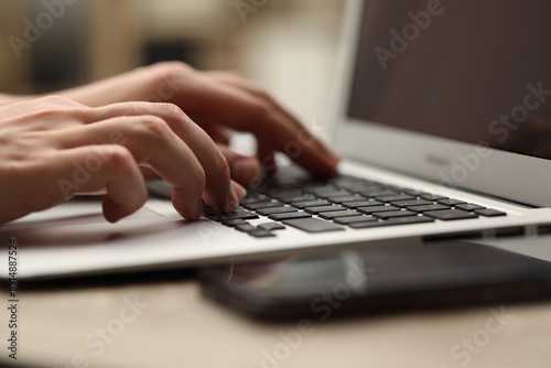 Businessman using laptop at table, closeup. Modern technology