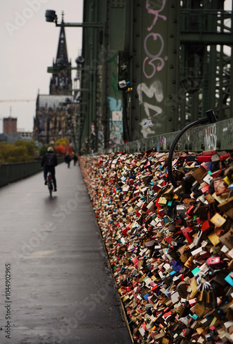 Wallpaper Mural Locks on the fence of an iron bridge for trains against the background of the historical building of Cologne Cathedral Torontodigital.ca
