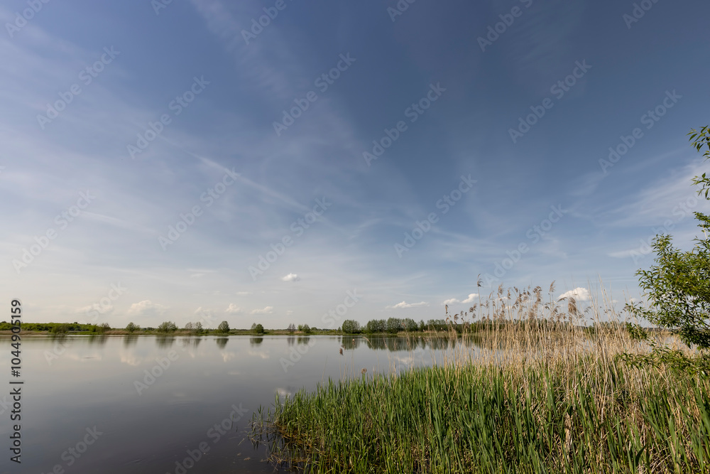 a beautiful lake against the blue sky a beautiful lake against the blue sky