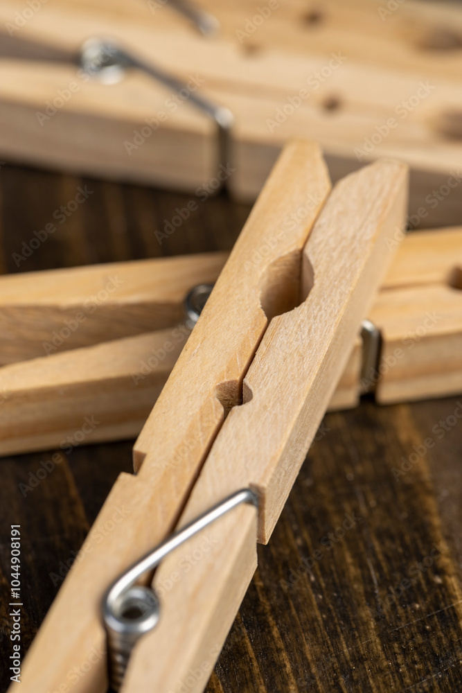a group of wooden clothespins for drying clothes a group of wooden clothespins for drying clothes