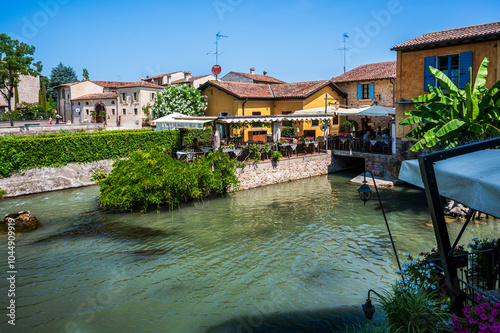 Summer on the Mincio river. Historic village of Borghetto sul Mincio photo