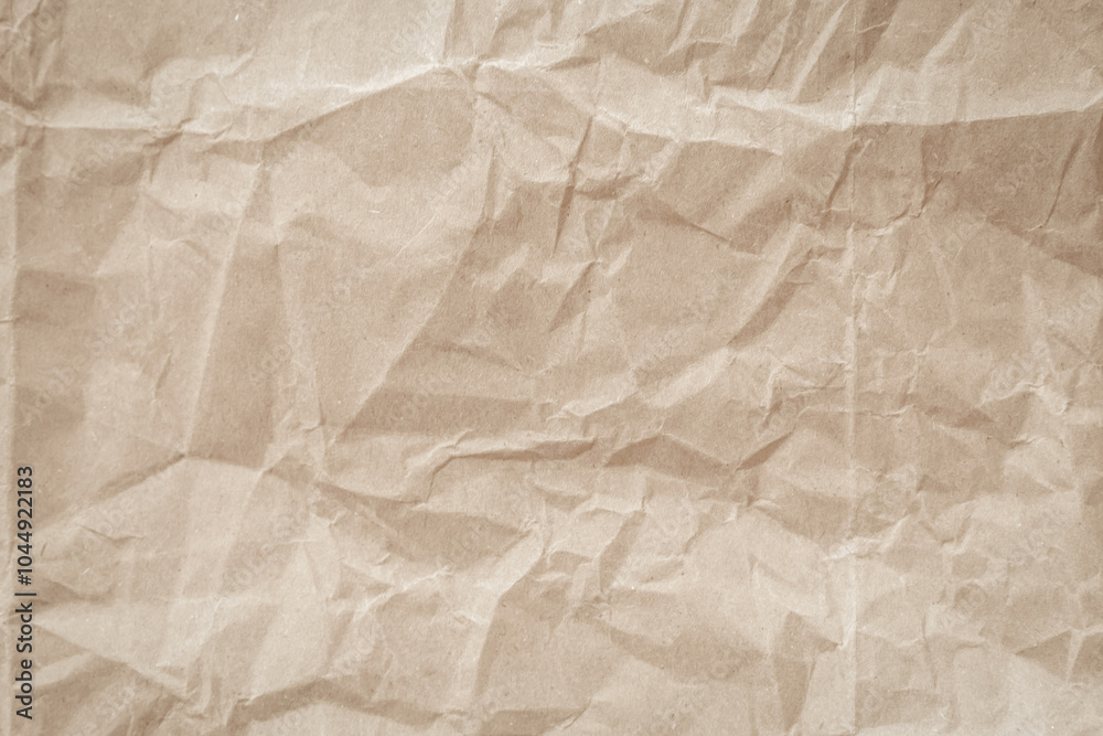 Crumpled brown paper texture background for design with copy space for text or image. Crumpled brown paper texture background for design with copy space for text or image.