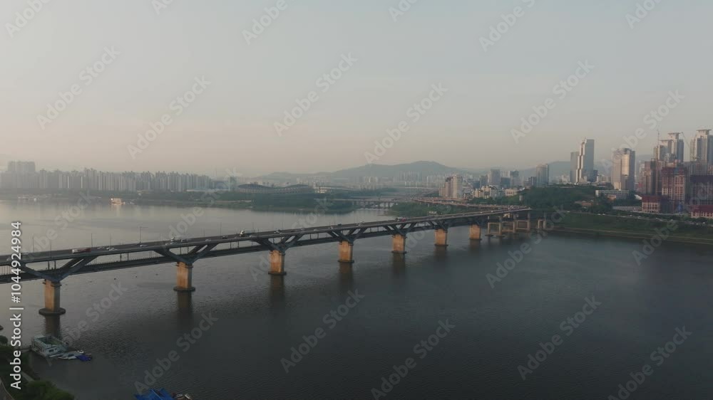 Morning Glow Over Seoul’s Han River - Bridge with Subway and Roadway Scene Morning Glow Over Seoul’s Han River - Bridge with Subway and Roadway Scene