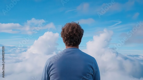 Contemplative person against cloudy sky