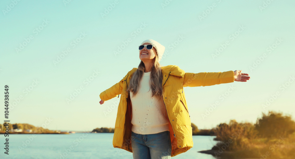 Happy smiling woman on sunny beach, joyful girl enjoying landscape, warm weather on sea coast Happy smiling woman on sunny beach, joyful girl enjoying landscape, warm weather on sea coast