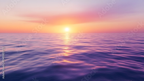 A calm sea at sunset, with the horizon blending into a gradient of purples and oranges, creates an atmosphere that feels serene and peaceful.