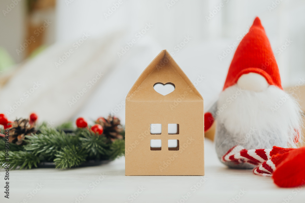 Fototapeta premium Decorative holiday display featuring a gnome and a heart-shaped box