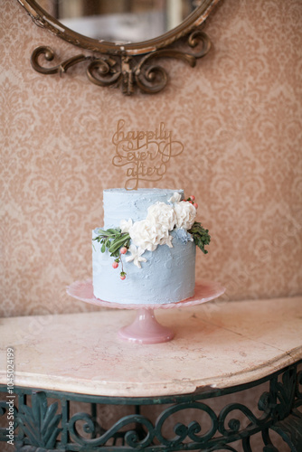 Two-tier blue frosting wedding or birthday cake, Happily Ever After cake topper, Vintage Retro Wedding Day Cake, Flowers on a cake, Bridal cake, Vintage pink glass cake dish