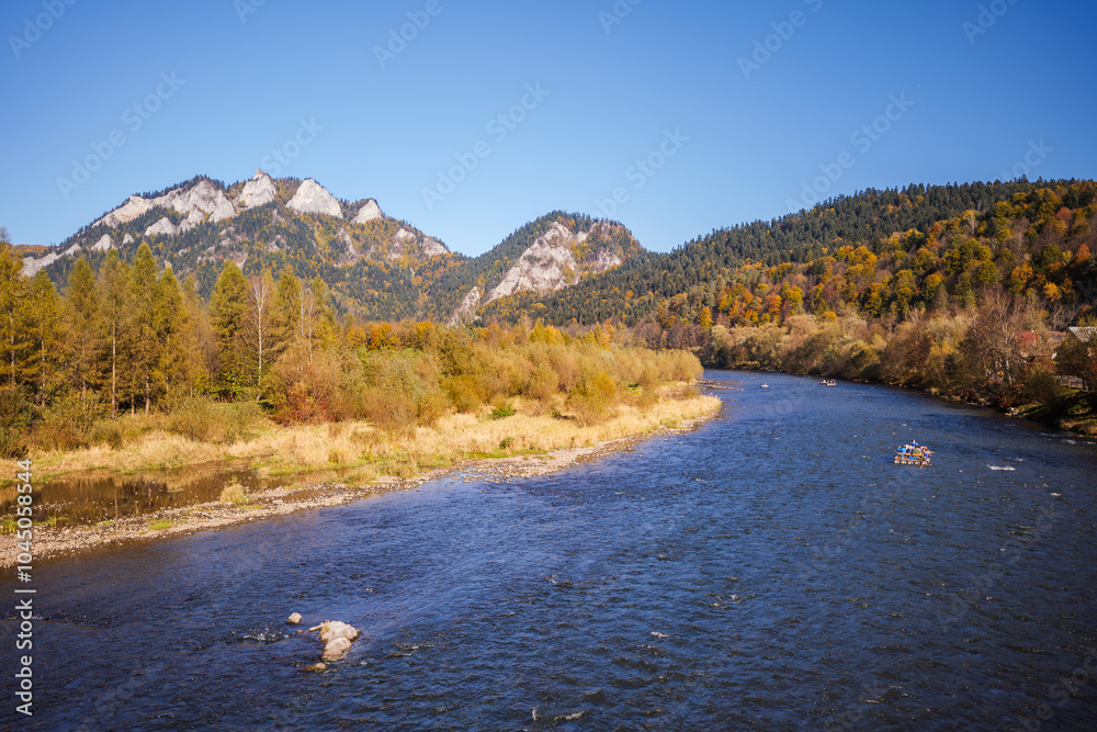 Polish mountains in autumn. Pieniny Mountains. View towards the rocky peaks of Trzy Korony. The Dunajec River in the Foreground. Sromowce Nizne, Poland