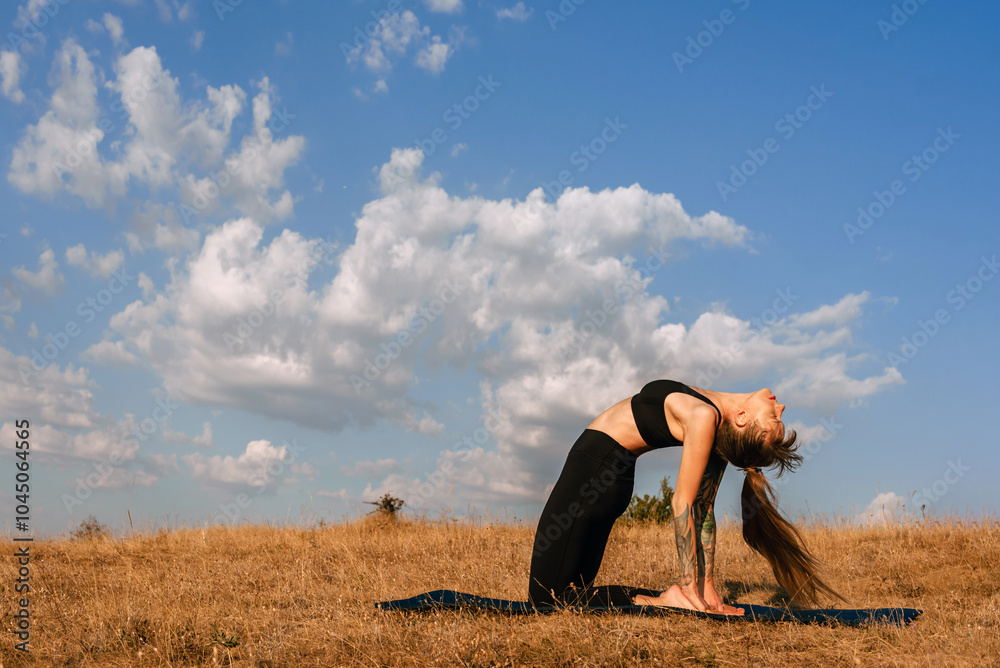 Woman Doing Yoga Class Outdoors in Morning