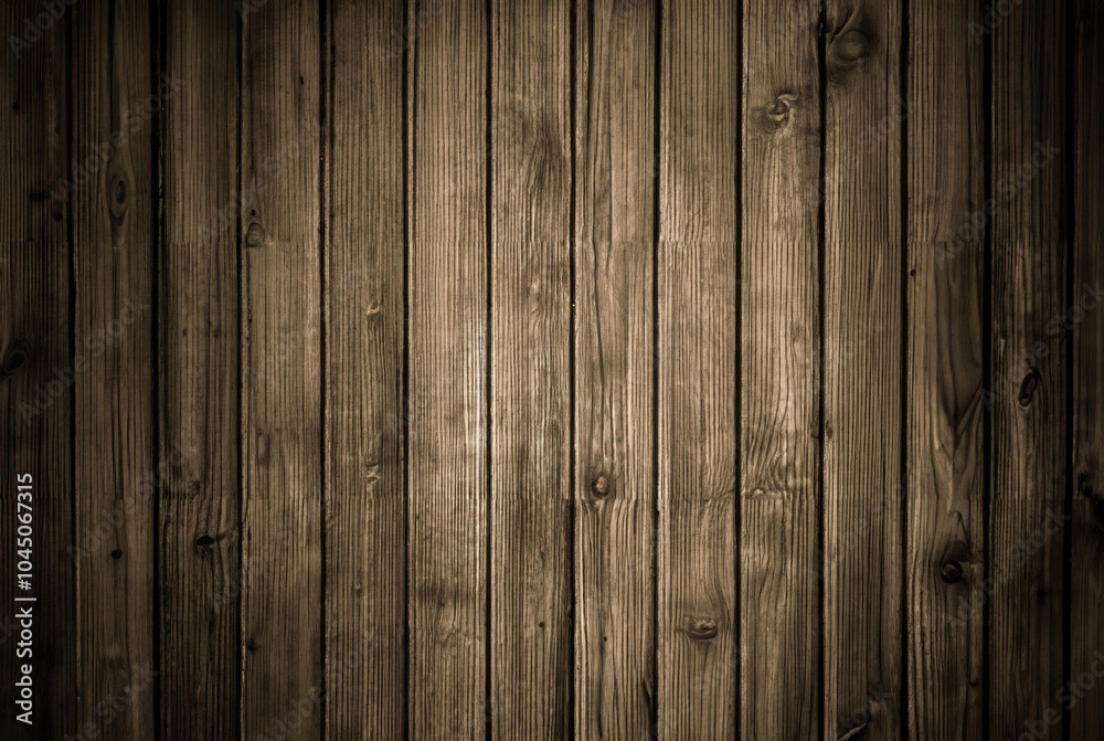 Rustic wooden plank wall with dark tones and visible vertical grain texture, ideal for backgrounds and wood-themed designs. Rustic wooden plank wall with dark tones and visible vertical grain texture, ideal for backgrounds and wood-themed designs.