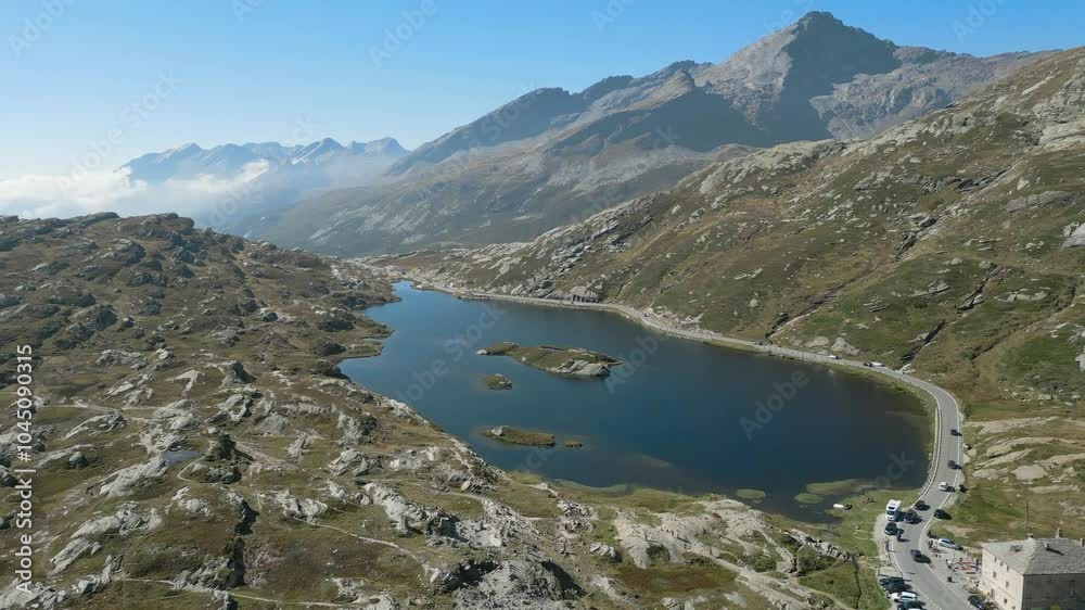 Stunning landscapes of the San Bernardino Pass in Switzerland, a breathtaking mountain route that offers panoramic views, winding roads, and serene alpine scenery. Stunning landscapes of the San Bernardino Pass in Switzerland, a breathtaking mountain route that offers panoramic views, winding roads, and serene alpine scenery.
