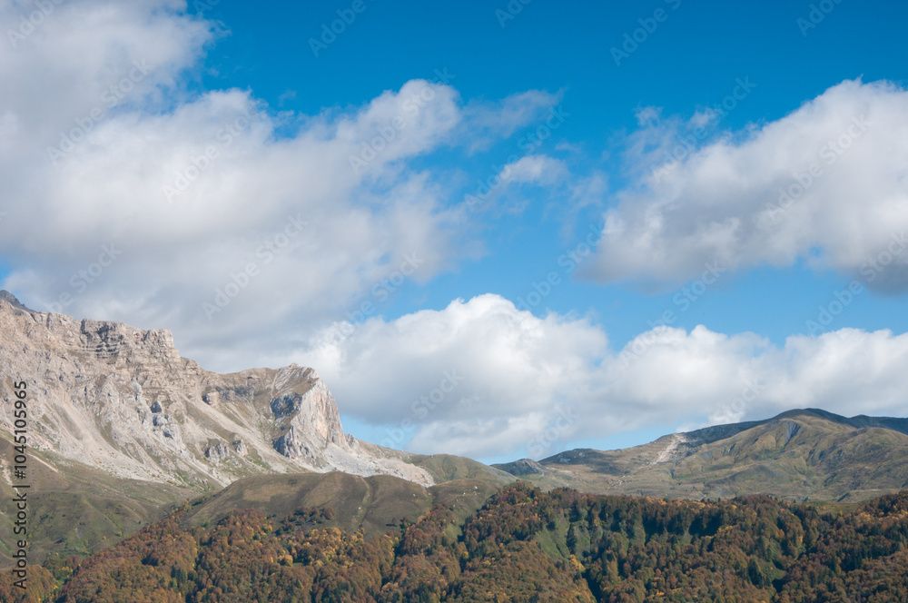 Landscape view of Fisht-Oshten massif and other Caucasus mountains in autumn, Russian Federation Landscape view of Fisht-Oshten massif and other Caucasus mountains in autumn, Russian Federation