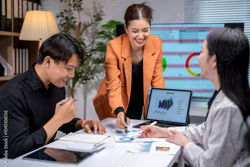 Team of asian businesspeople are discussing over new business project in office