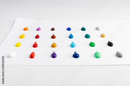 Paint blobs of different colors isolated on white, set