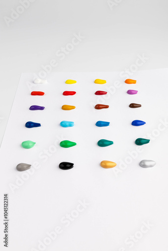 Paint blobs of different colors isolated on white, set