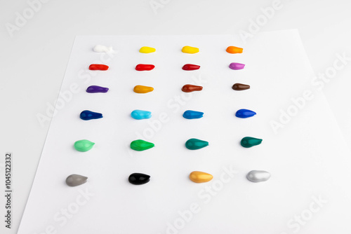 Paint blobs of different colors isolated on white, set