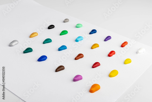 Paint blobs of different colors isolated on white, set