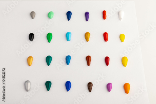 Paint blobs of different colors isolated on white, set