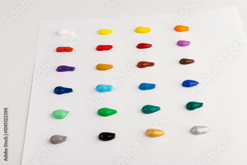 Paint blobs of different colors isolated on white, set