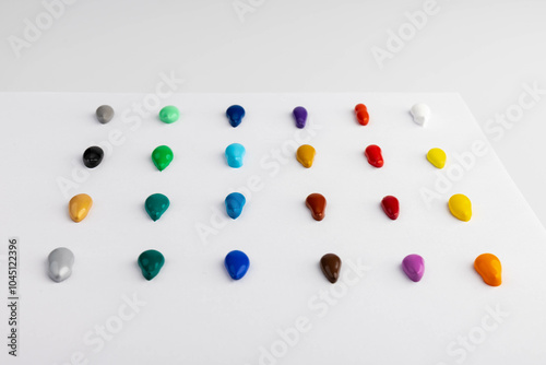 Paint blobs of different colors isolated on white, set