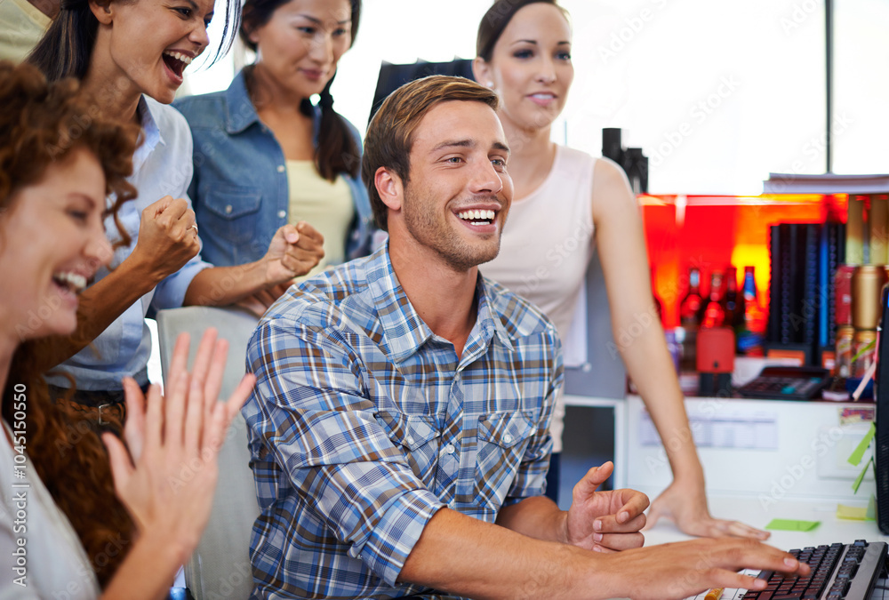 Obraz premium Man, team and celebration by computer in office for goals, success and applause at media company. Person, excited group and diversity with pc for support, cheers and profit at startup creative agency