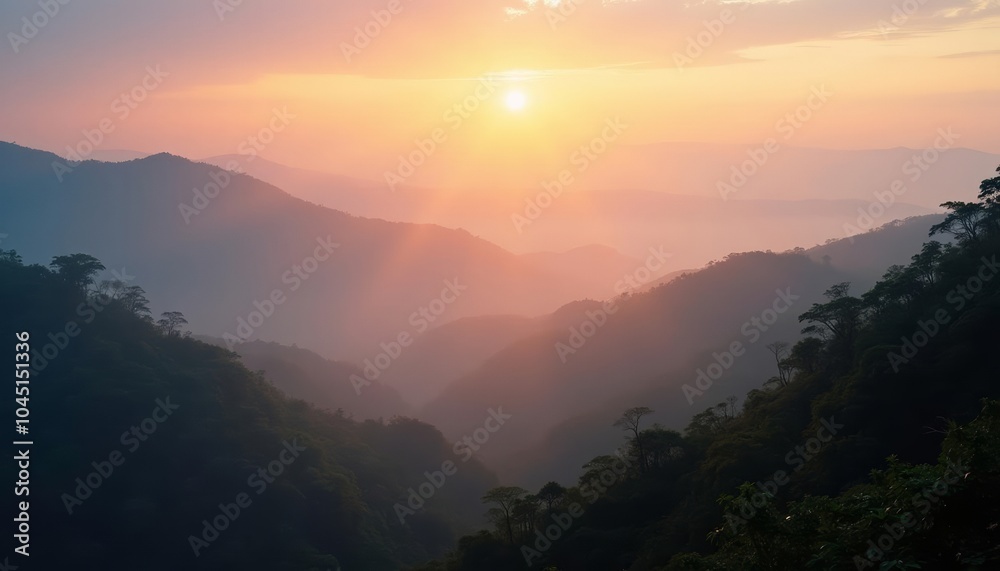 Glowing sunrise over misty mountain valley Glowing sunrise over misty mountain valley