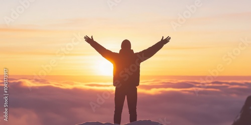 Wallpaper Mural Person standing on a mountain with arms outstretched, sunset backdrop. Torontodigital.ca