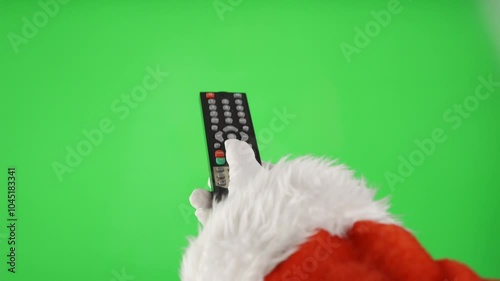 Santa using a television remote control
