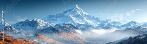 Mountains with snow on them and a blue sky in the background