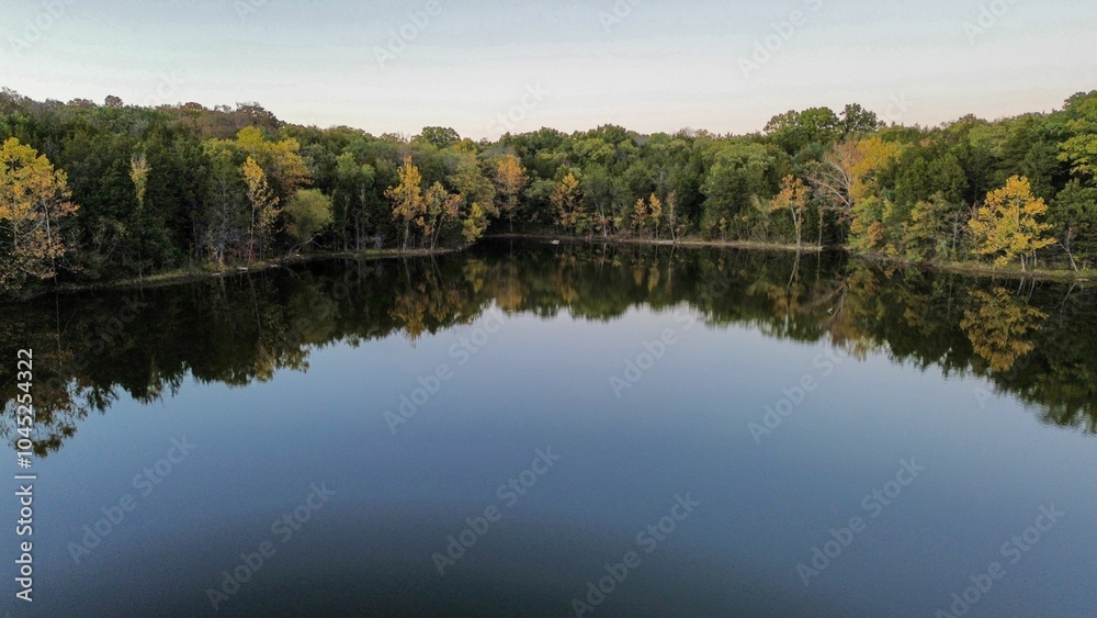 Serene Lake Reflection in Autumn Serene Lake Reflection in Autumn