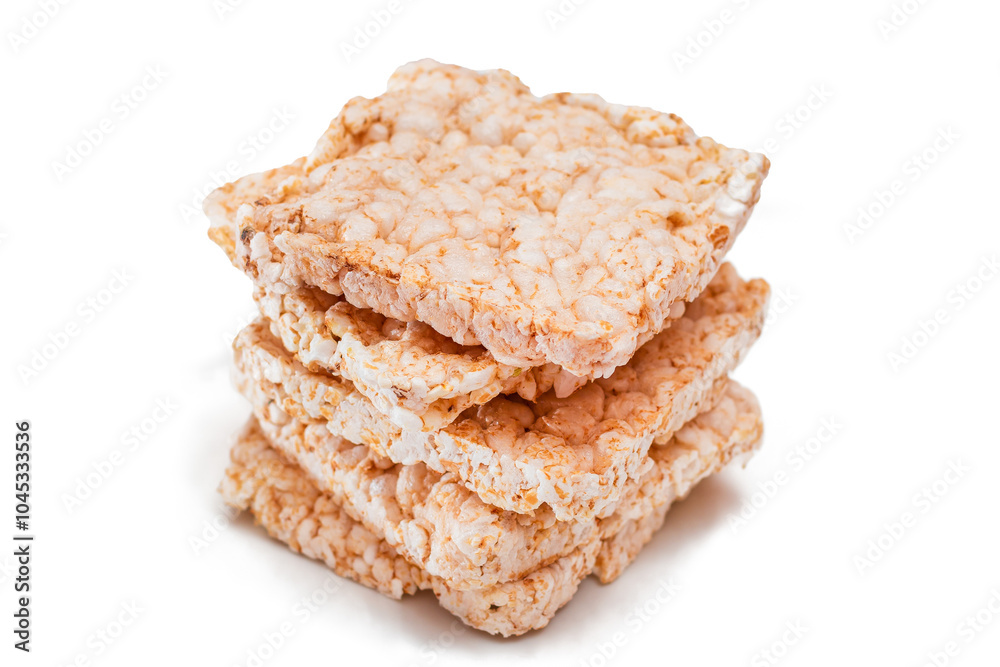 A Stack of Square Rice Cakes - Isolated on White. Dietary Crispbread - Isolation A Stack of Square Rice Cakes - Isolated on White. Dietary Crispbread - Isolation