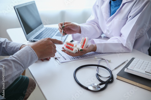 woman consults dentist about her toothache for treatment in dental clinic and dentist gives advice on right symptoms and treatment method for patient. concept consulting dentist about dental treatment