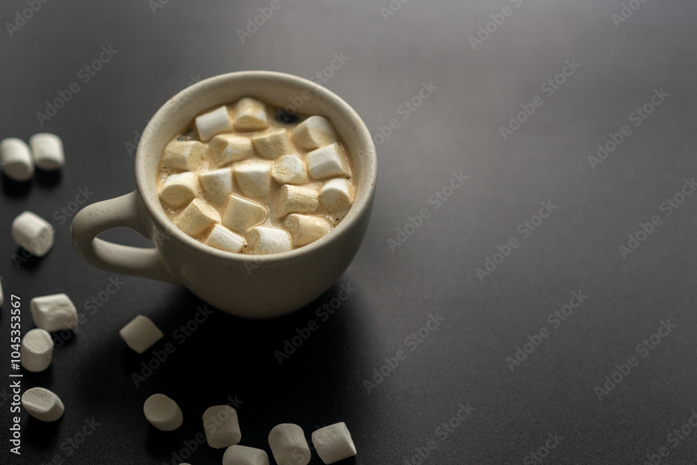 cup of coffee with marshmallow on the black background cup of coffee with marshmallow on the black background