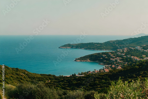 Neighbourhood Real Estate - Scenic coastal view with hills and calm blue waters under a clear sky.