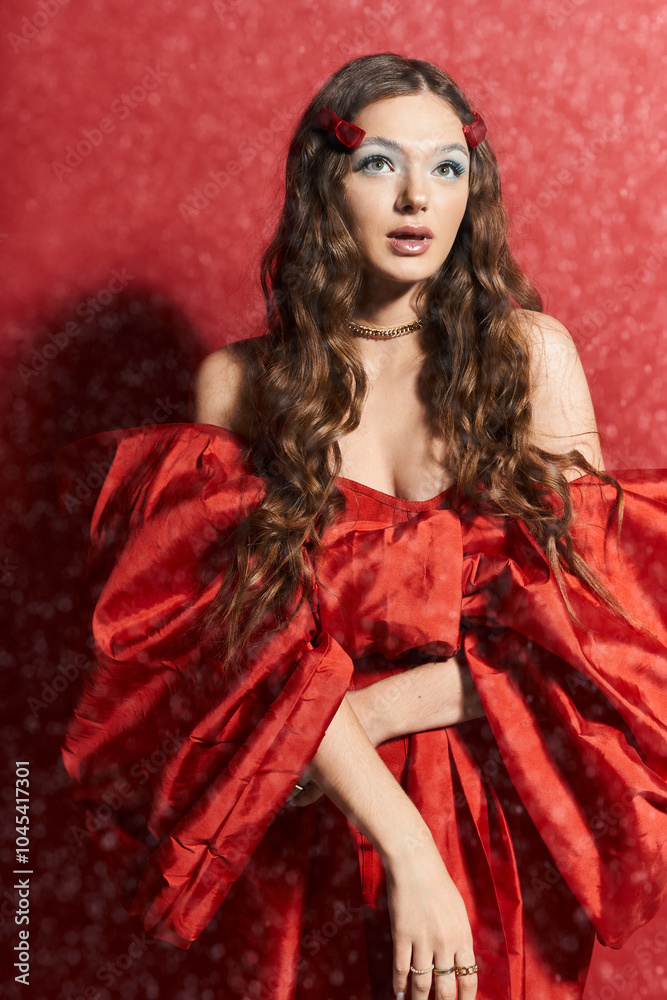 A beautiful young woman poses elegantly in a striking red outfit, exuding confidence and charm. A beautiful young woman poses elegantly in a striking red outfit, exuding confidence and charm.