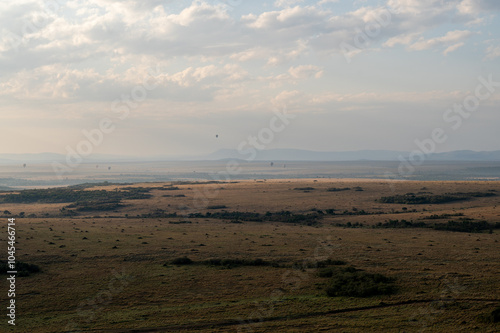 Nairobi, Kenya - Sept 26 2024: A Hot Air Balloons Floating Over the Expansive Plains of Maasai Mara National Park