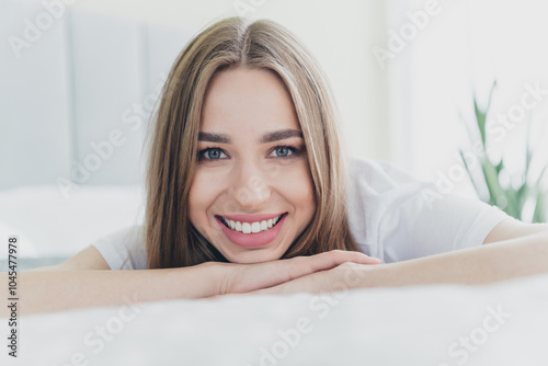 Photo of adorable sweet lady sleepwear smiling having rest bed indoors room home house