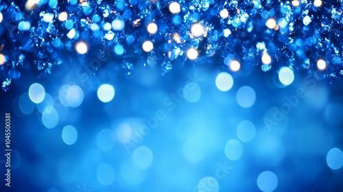 Blue glitter background with bokeh lights