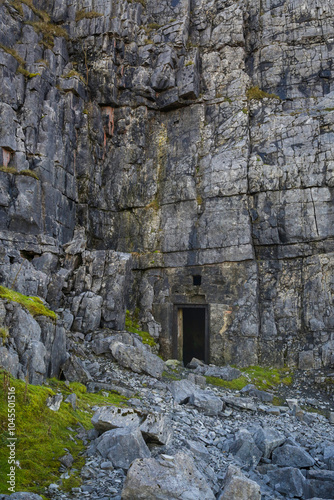 A door to a room in Herbert's quarry on the Black Mountain in Carmarthenshire, South Wales, UK
 photo