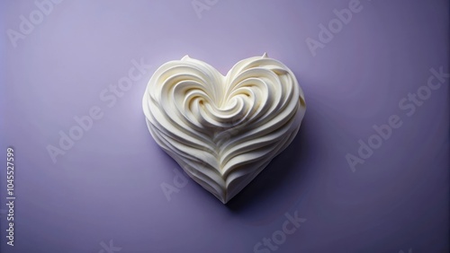 A heart-shaped swirl of white frosting, a simple and elegant design, representing love and joy.